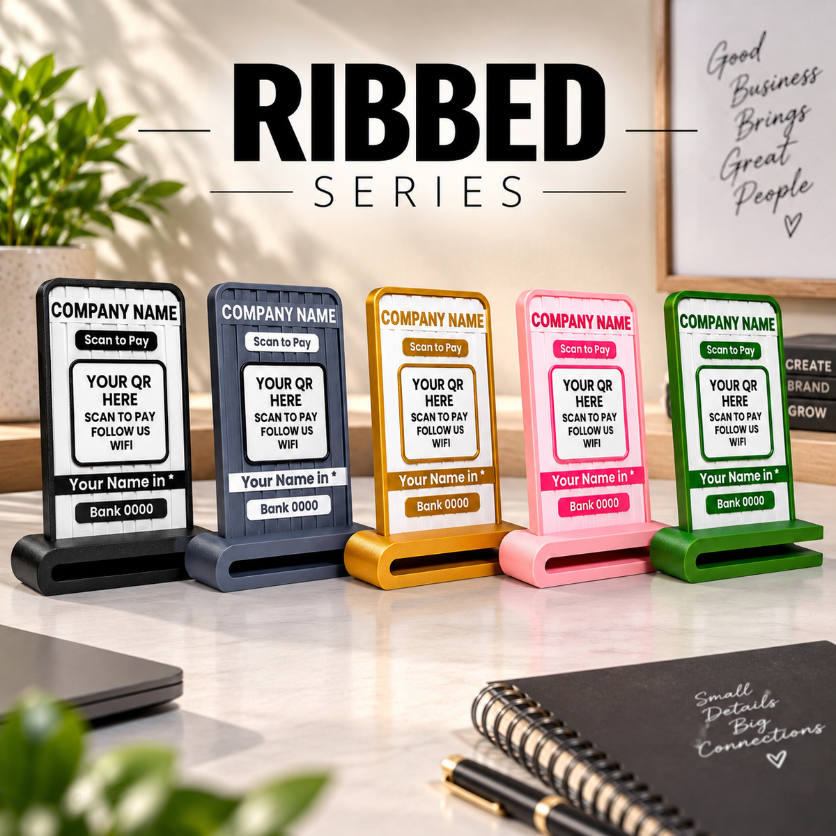 KMC Merch Ribbed Series QR payment stands in black, slate gray, gold, pink, and green, displayed together on a modern desk.