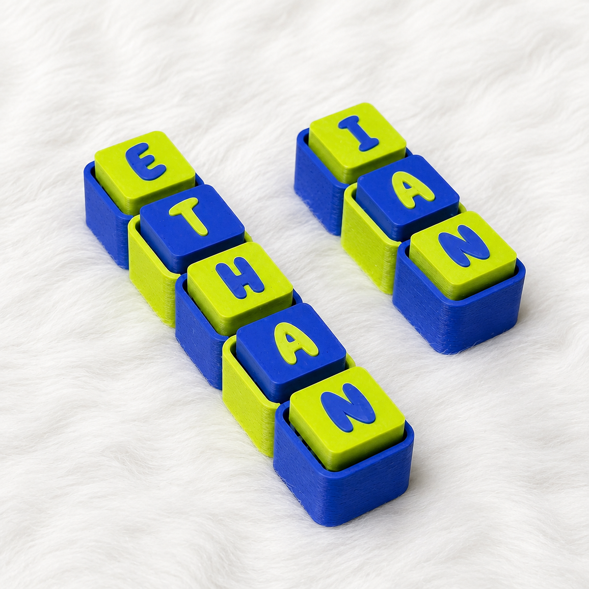 Lime green and blue personalized name keychains spelling ETHAN and IAN
